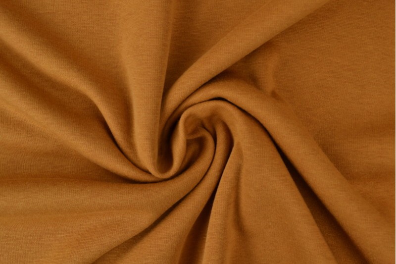Maille Alpenfleece tissu sweat jaune ocre foncé