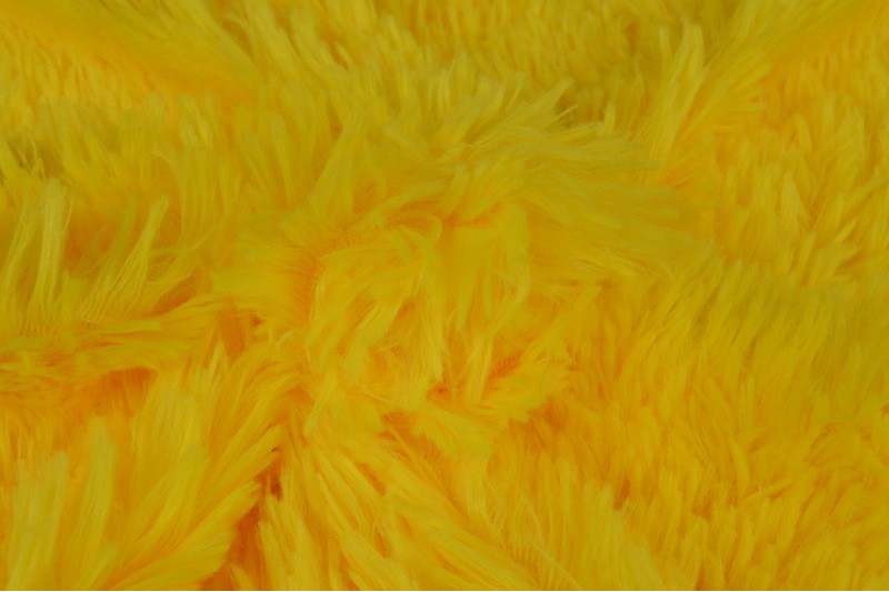 Fourrure à poils longs jaune