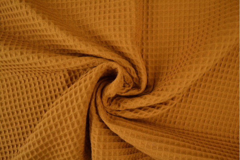 Gaufrette tissu jaune ocre foncé